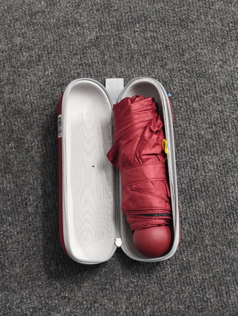 Folding portable umbrella